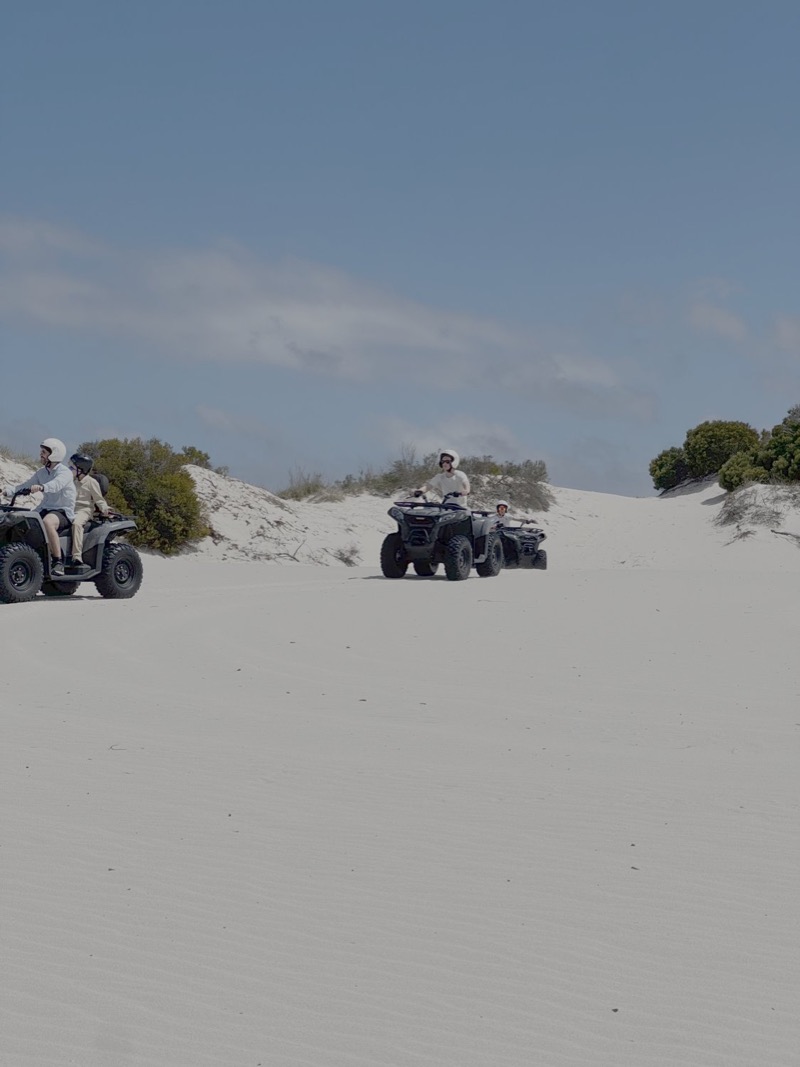 Quad bike ride across white sand dunes